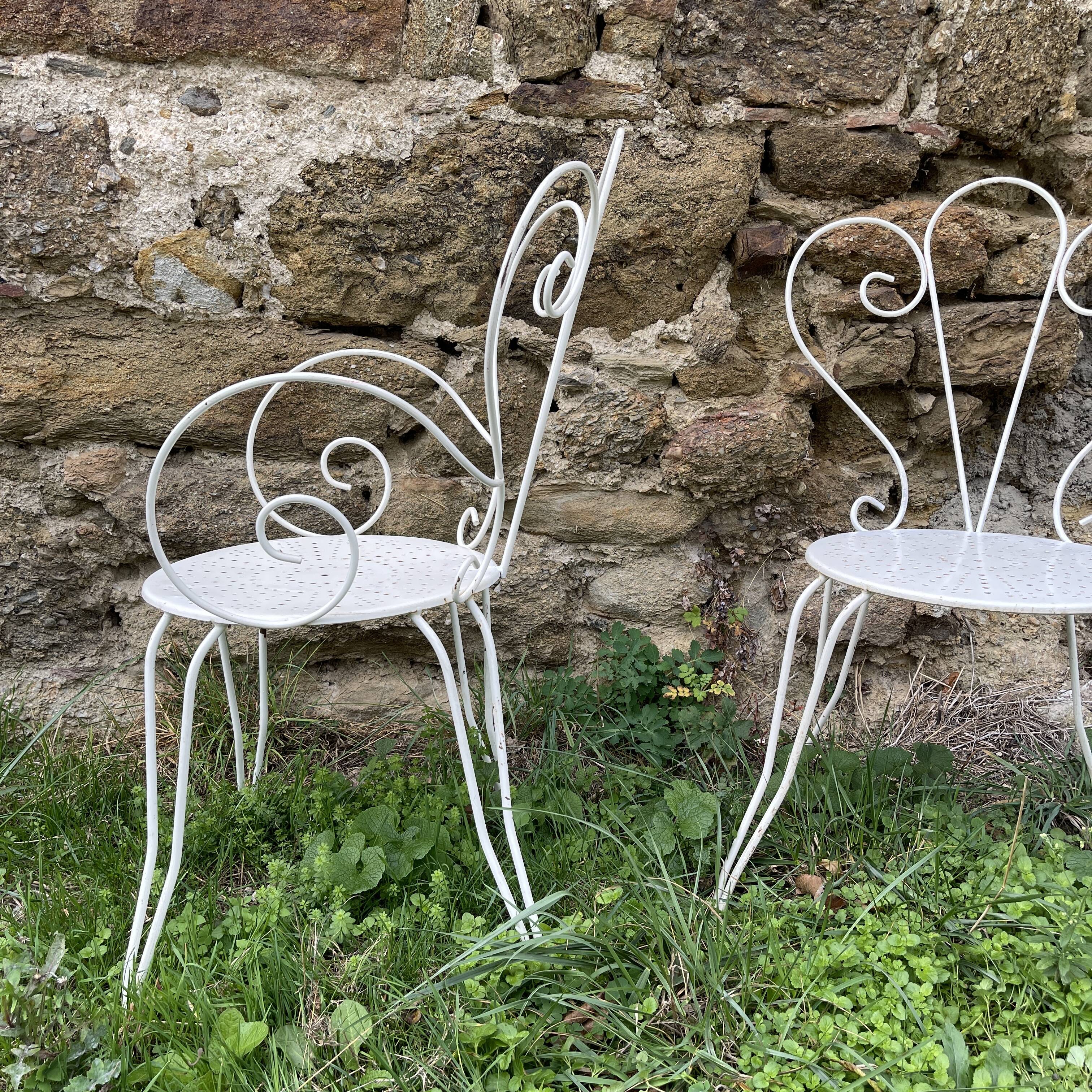 Armchair and garden chair in wrought iron