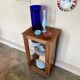 Dark wood display case and transparent glass