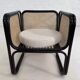 Cubic armchair in black rattan and canework