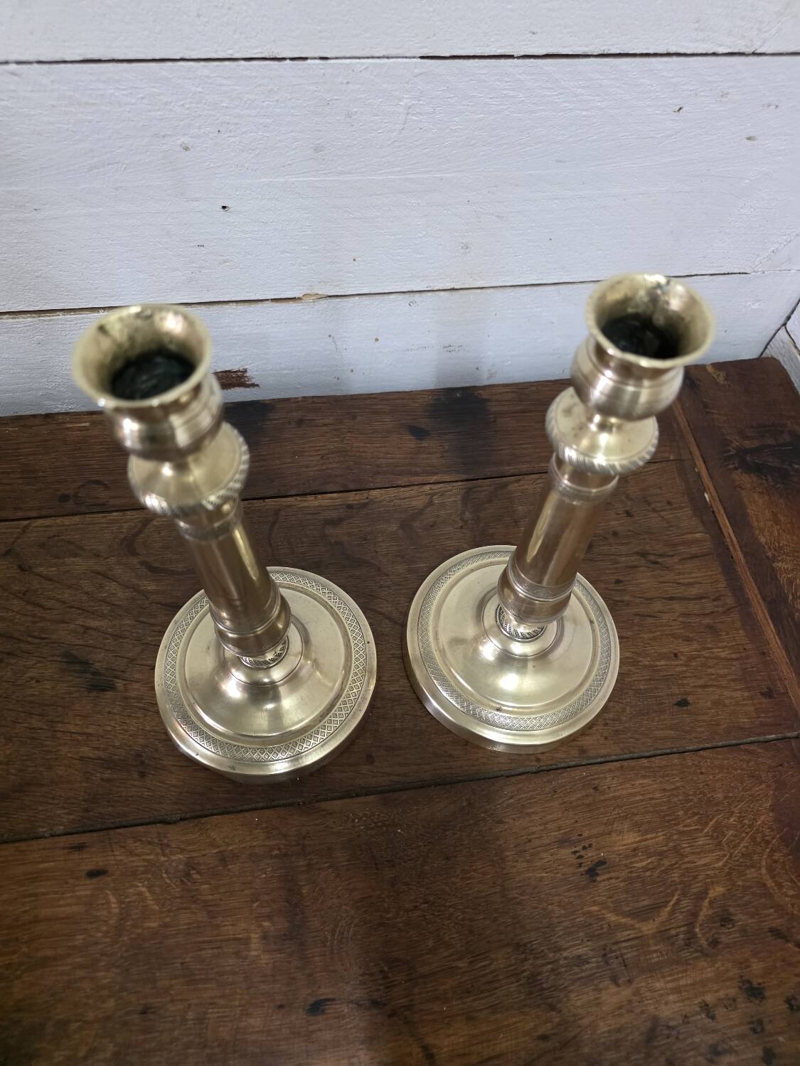 Antique pair of brass candlesticks
