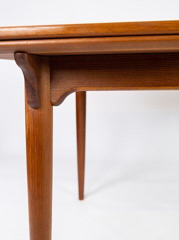 Dining table in teak with extentions of danish design from the 1960s.