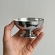 Set of 6 low footed bowls in mirror stainless steel.