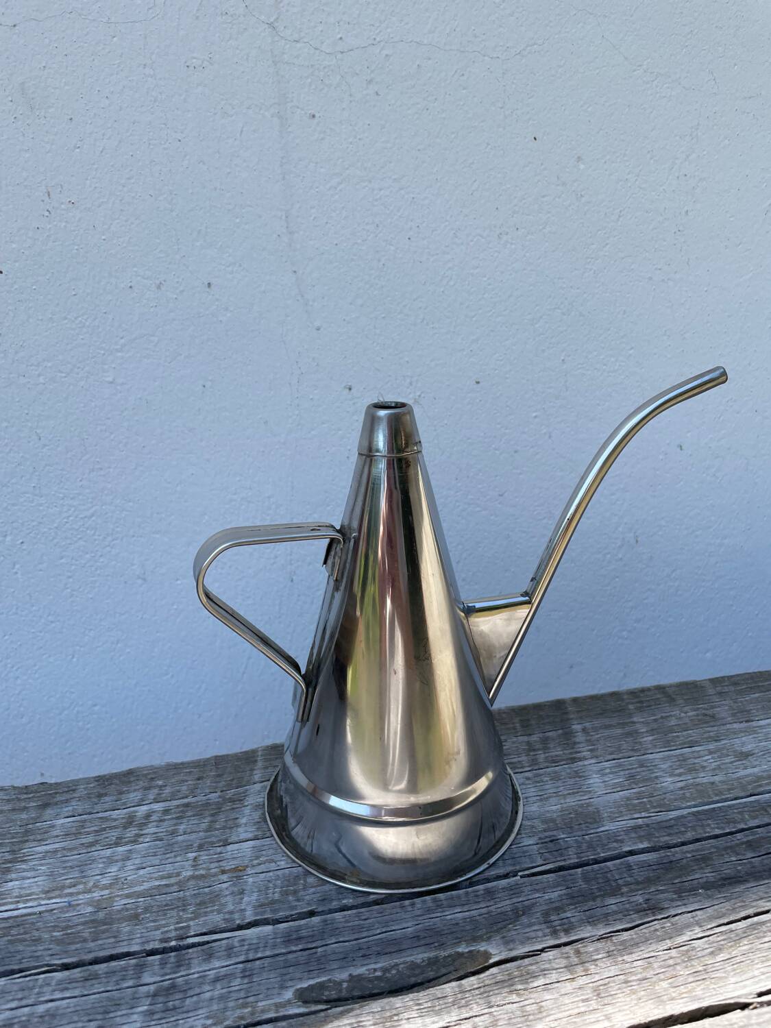 Small stainless steel watering can