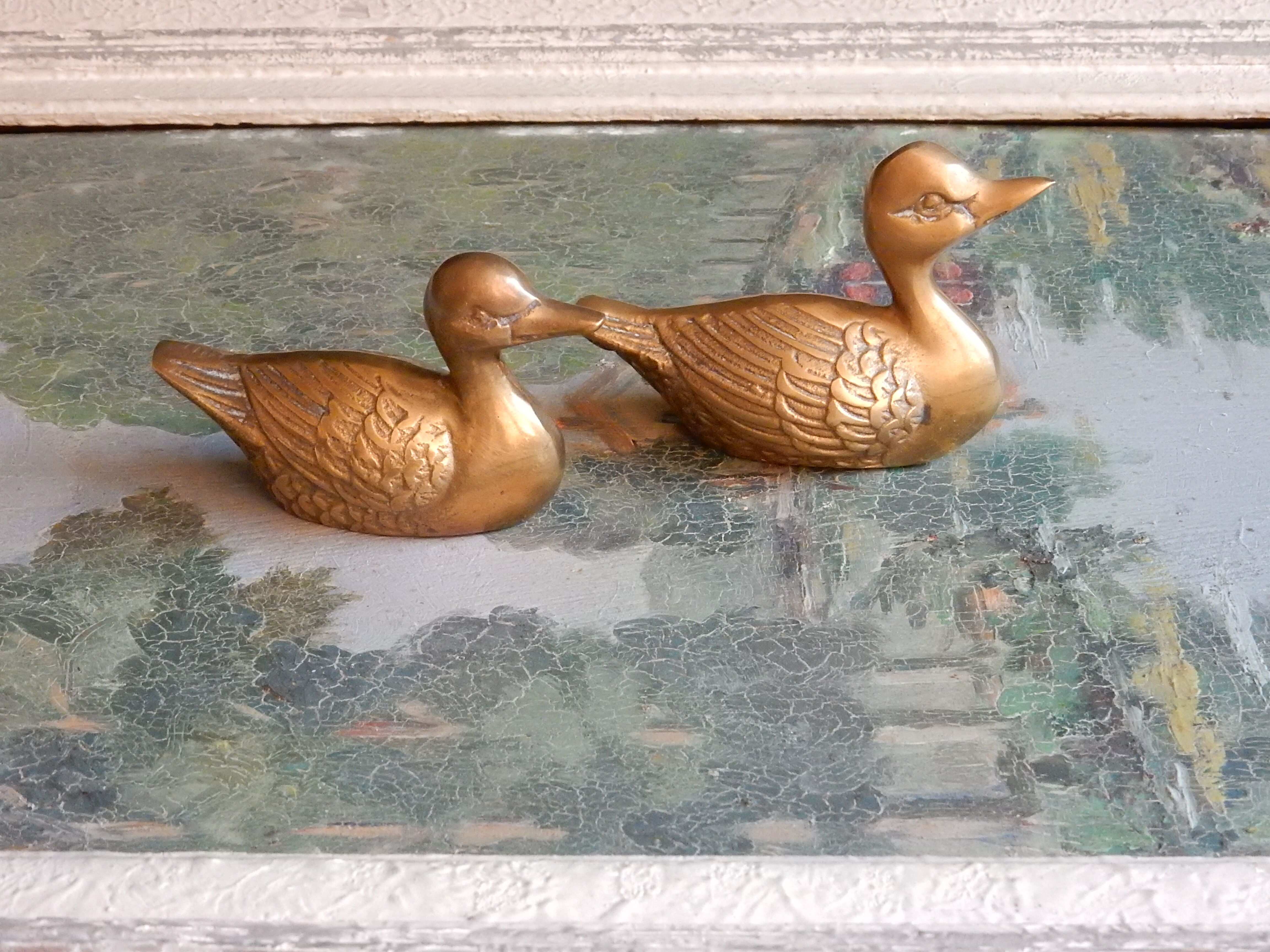 Couple of brass ducks