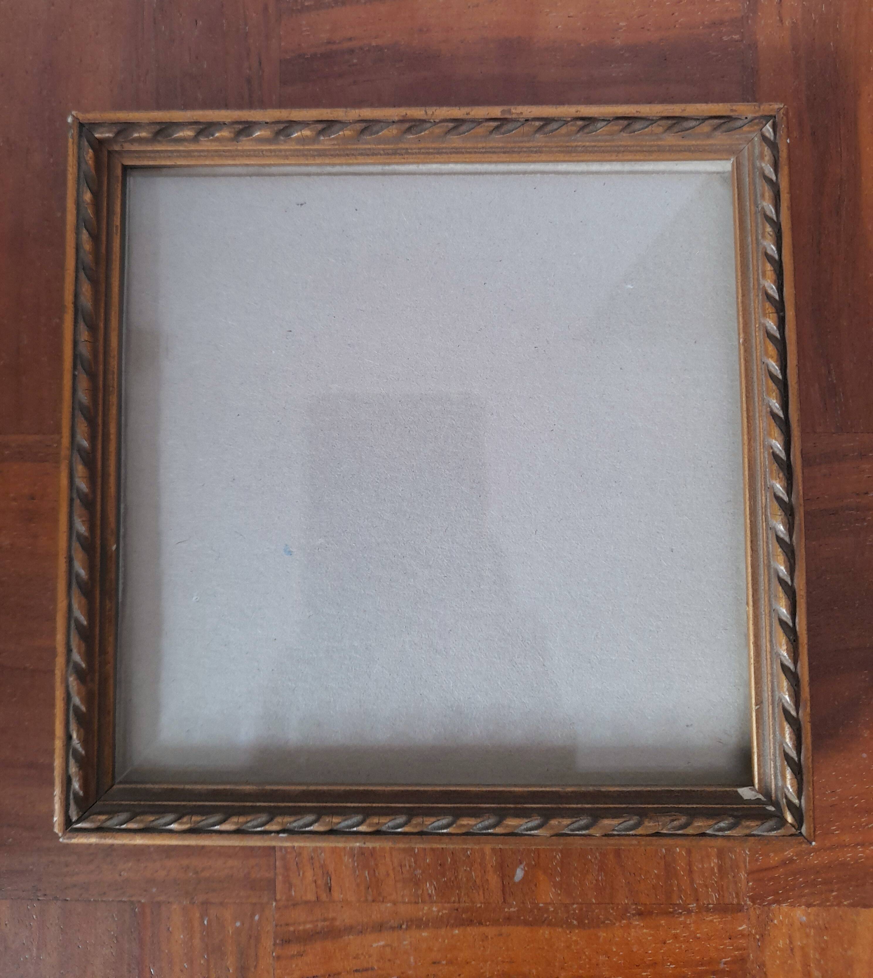 Old square golden frame to place or hang