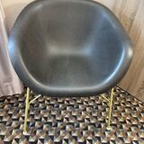 Designer armchair with a black shell – metal frame