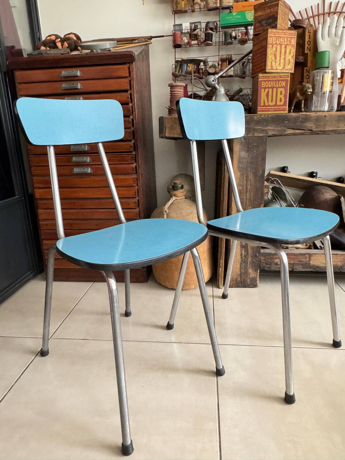 Pair of vintage blue Formica chairs