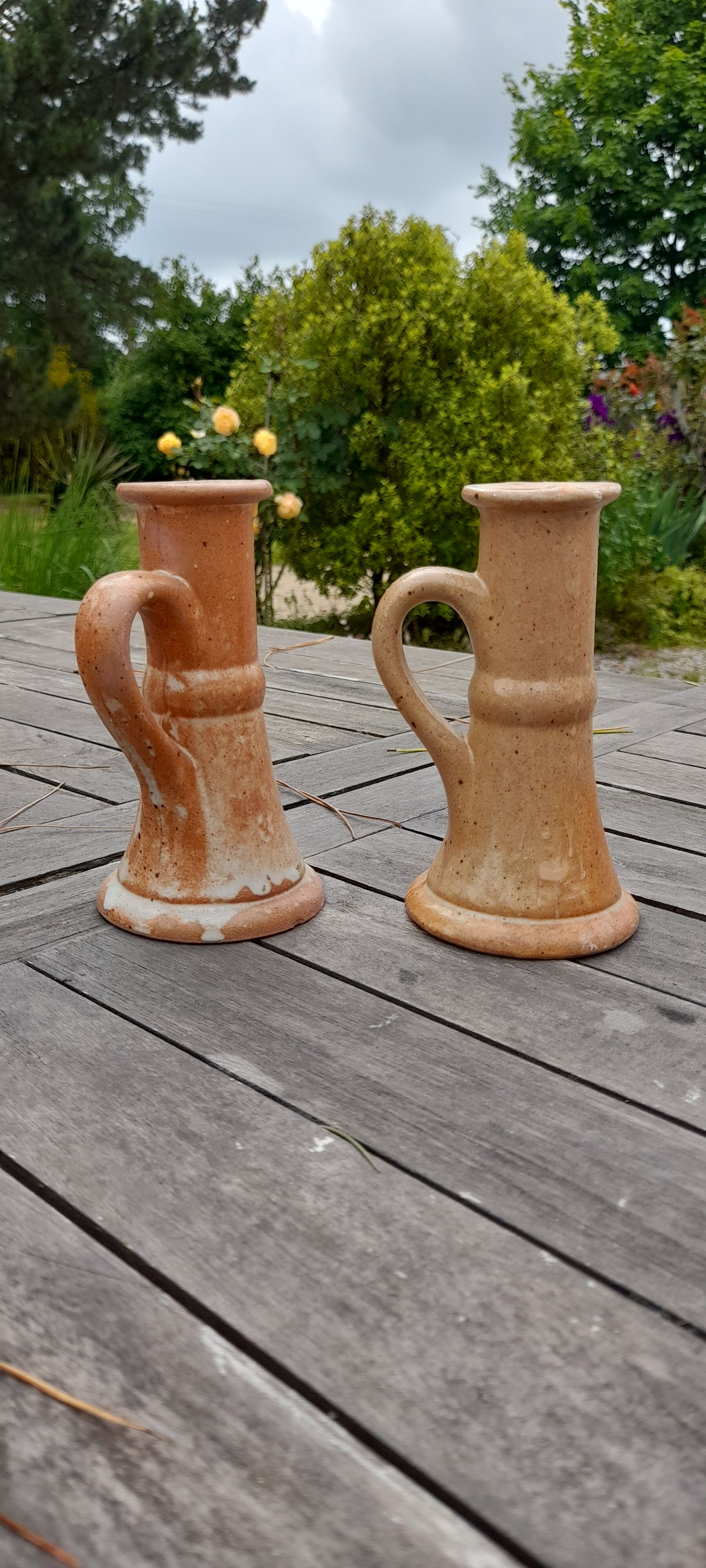 Duo of candlesticks in hand-crafted sandstone, raw and clean, mid-20th