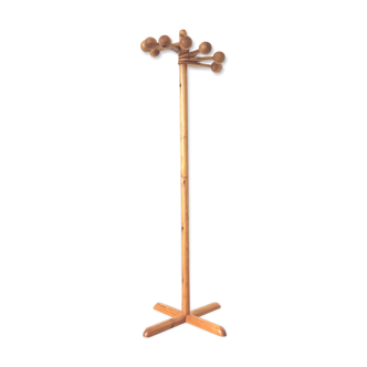 Coat holder on foot 8 orientable wooden balls