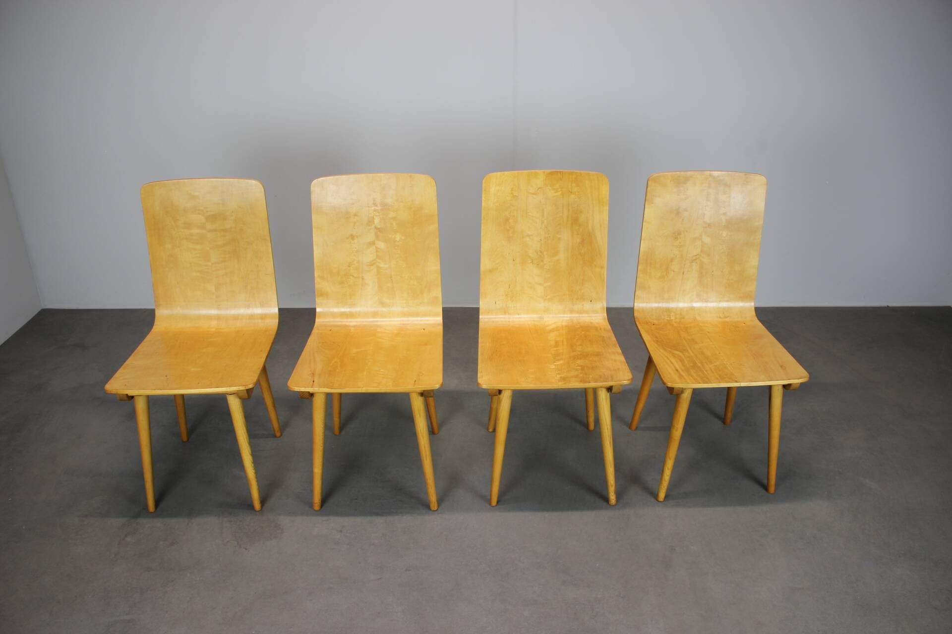 Set of 4 vintage wooden dining chairs in mid-century modern style, Europe, 1970s.