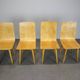 Set of 4 vintage wooden dining chairs in mid-century modern style, Europe, 1970s.