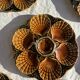 Set of 12 oyster or shell plates in glazed brown ceramic D