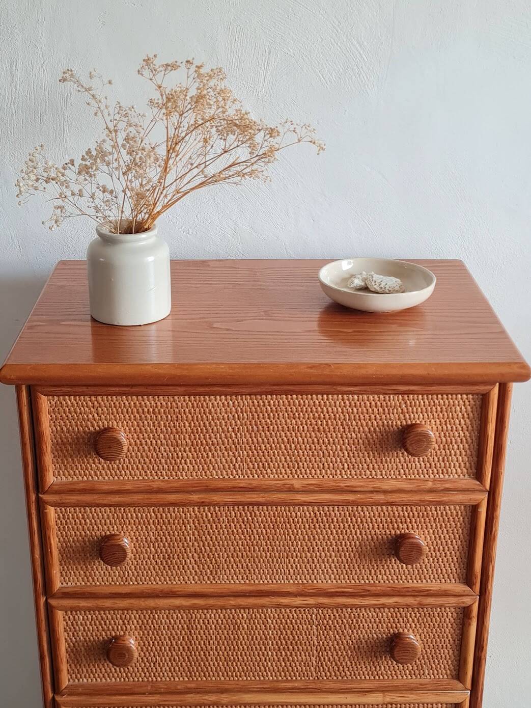 Vintage wicker chest of drawers.