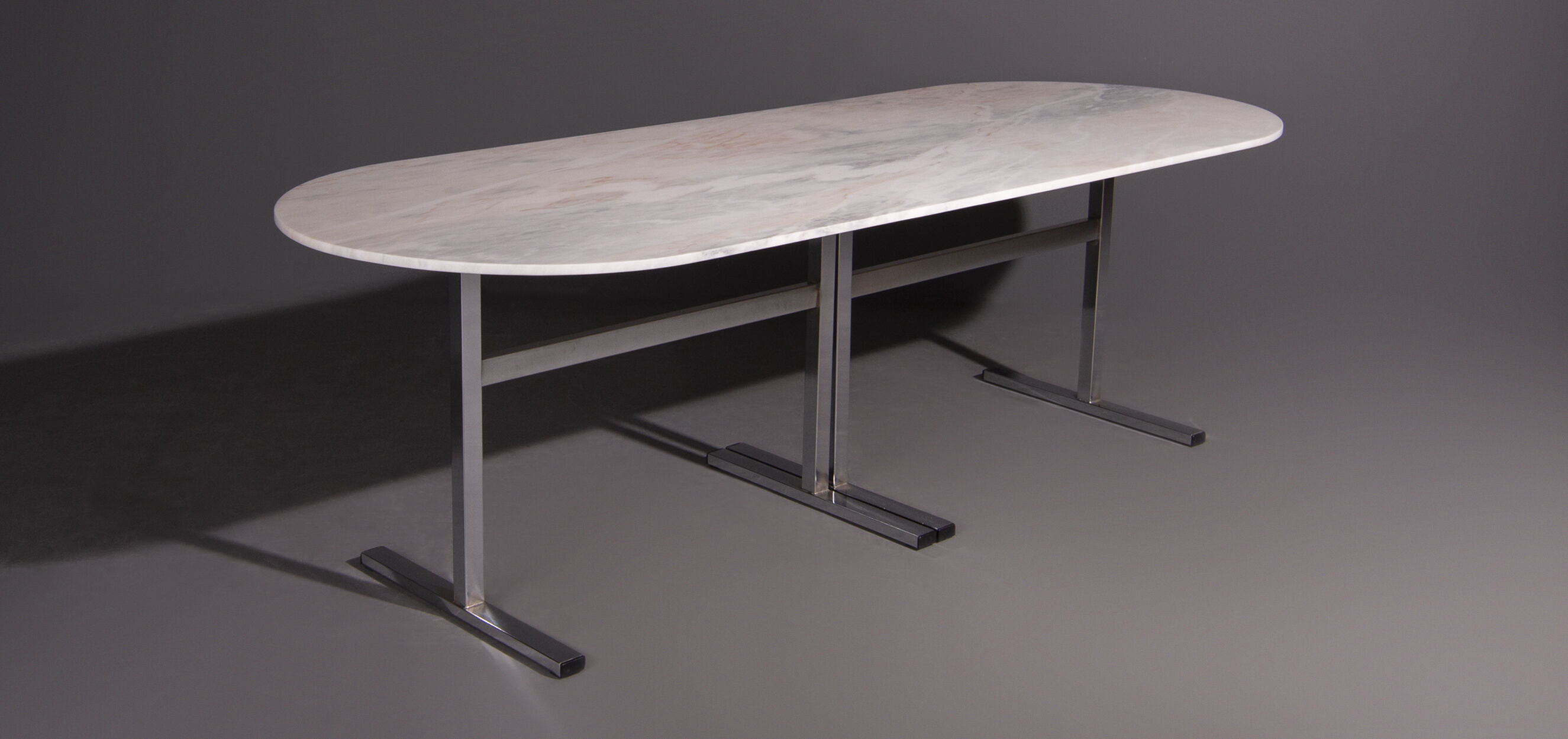 Dining table with oval Carrara marble top