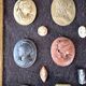 Collection of cameos and intaglios, shells and lava stones, around 1900.