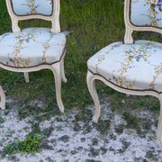 Pair of Louis XV style cabriolet chairs with a patina – floral fabric