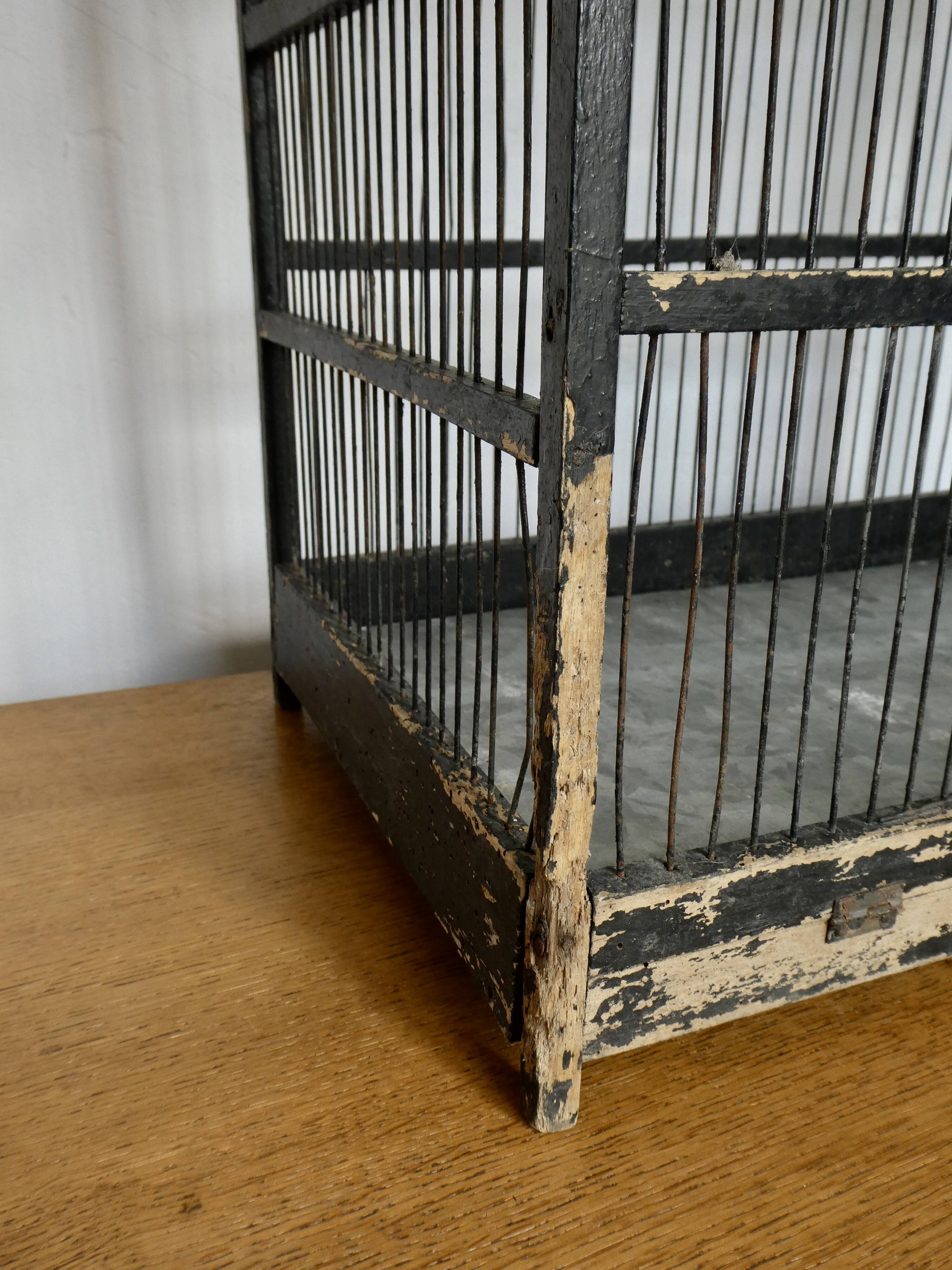 Wooden bird cage, original black patina, early 20th century