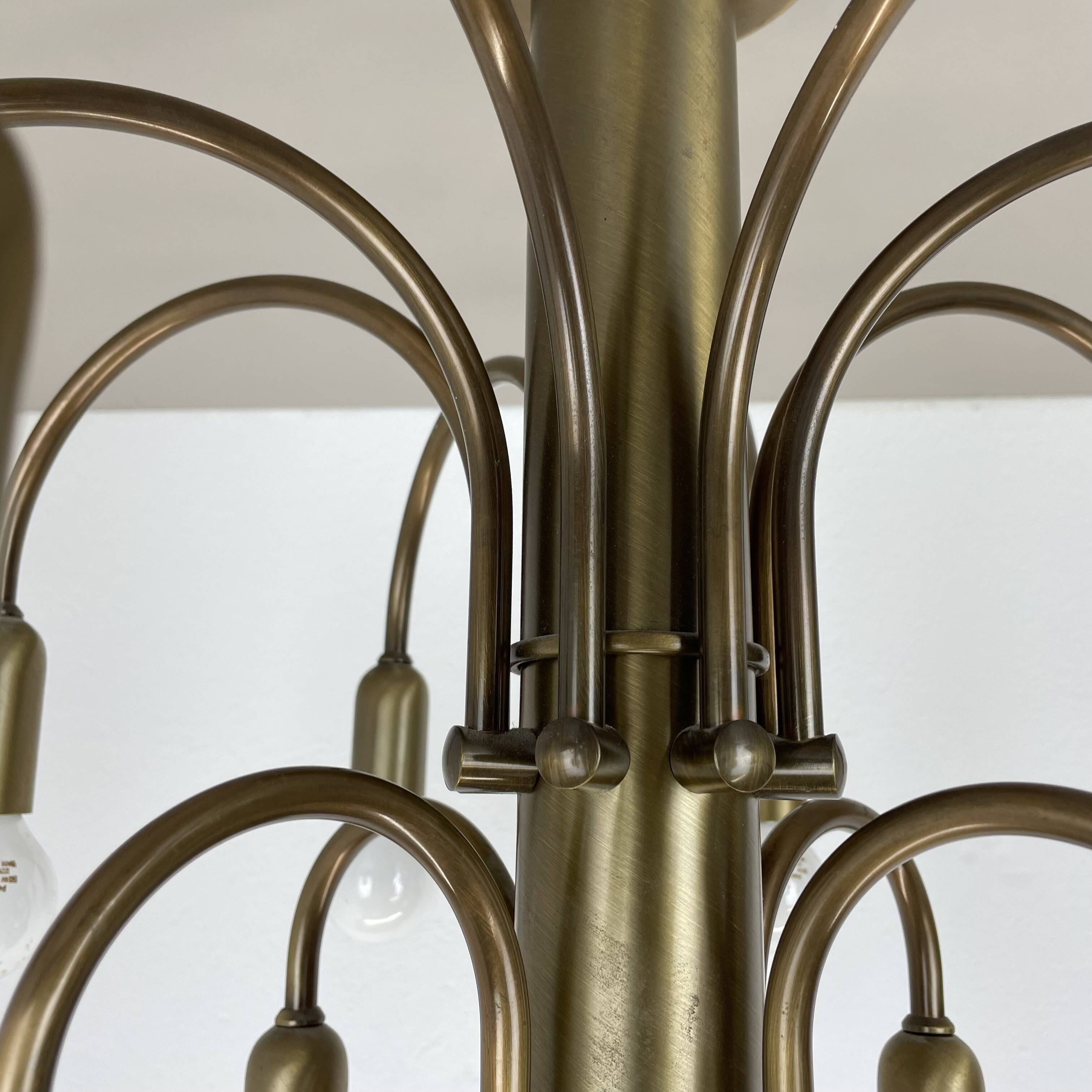 large 12-armed solid Brass ceiling light Chandelier by WKR Lights, Germany 1970s
