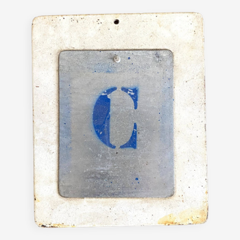 Letter C on metal plates