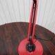 Red desk Guzzini lamp of the 1970s Italy