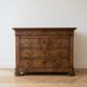 Antique chest of drawers with 4 solid wood drawers from the late 19th century.