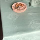 Old damask tablecloth tinted in pastel green
