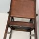 Colonial armchair in teak and leather
