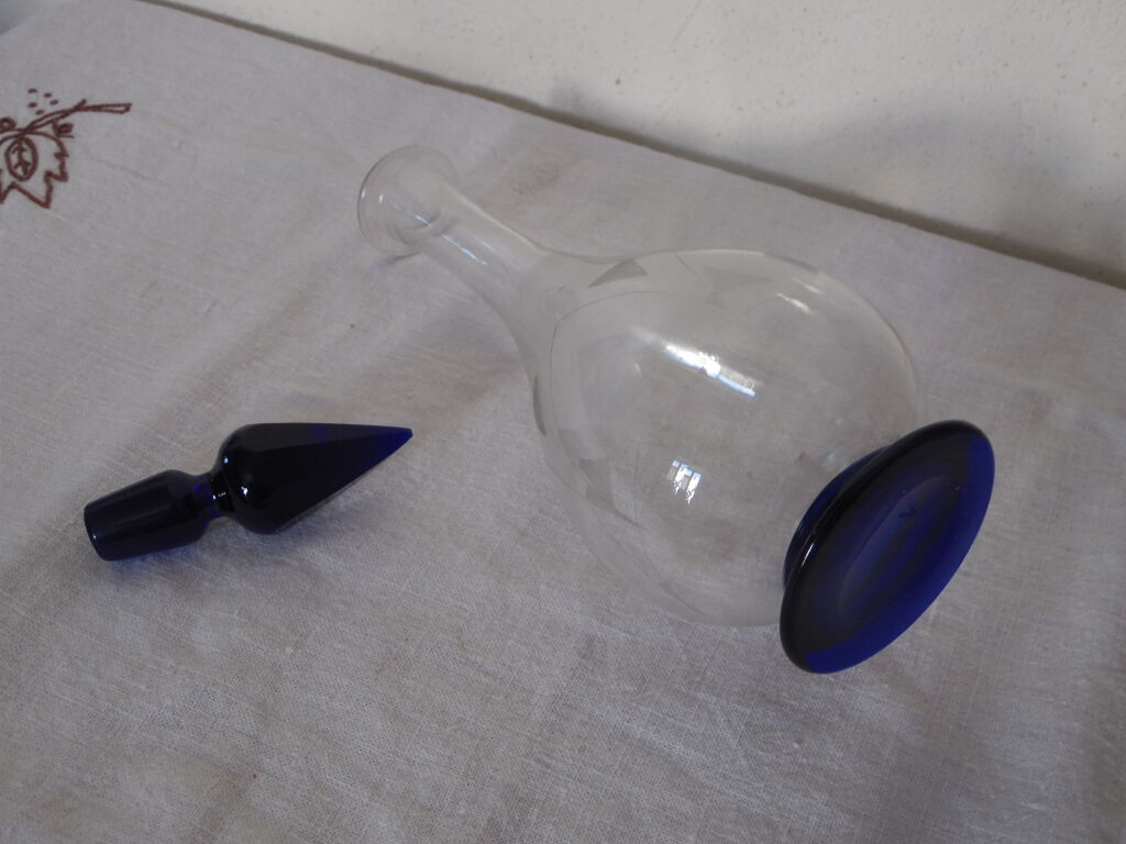 Small carafe with transparent cut glass liqueur and cobalt blue
