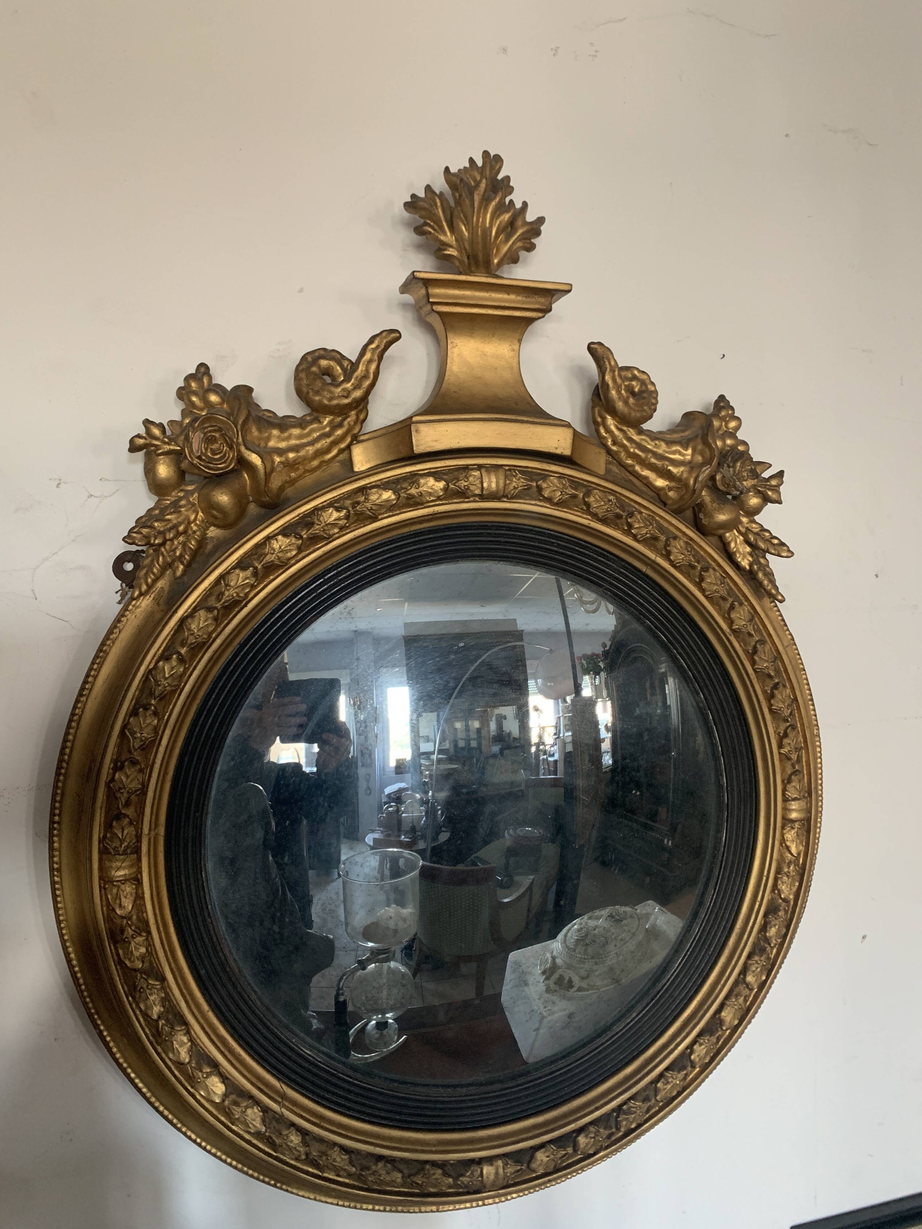 Miroir sorcière en bois sculpté doré XIX siècle