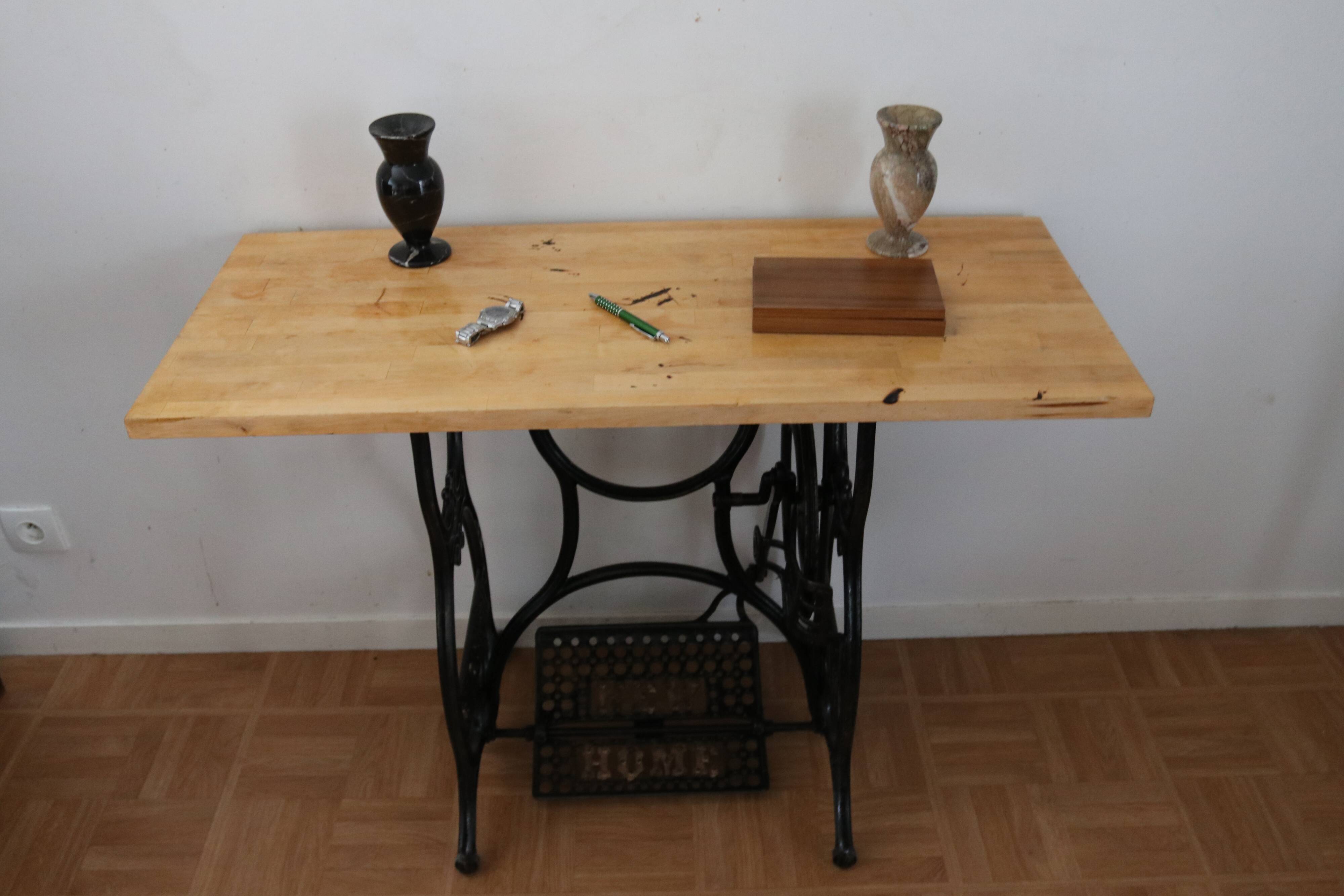 Living room console with sewing machine foot