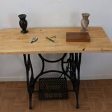 Living room console with sewing machine foot