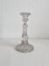 Antique baluster-shaped molded glass candlestick holder