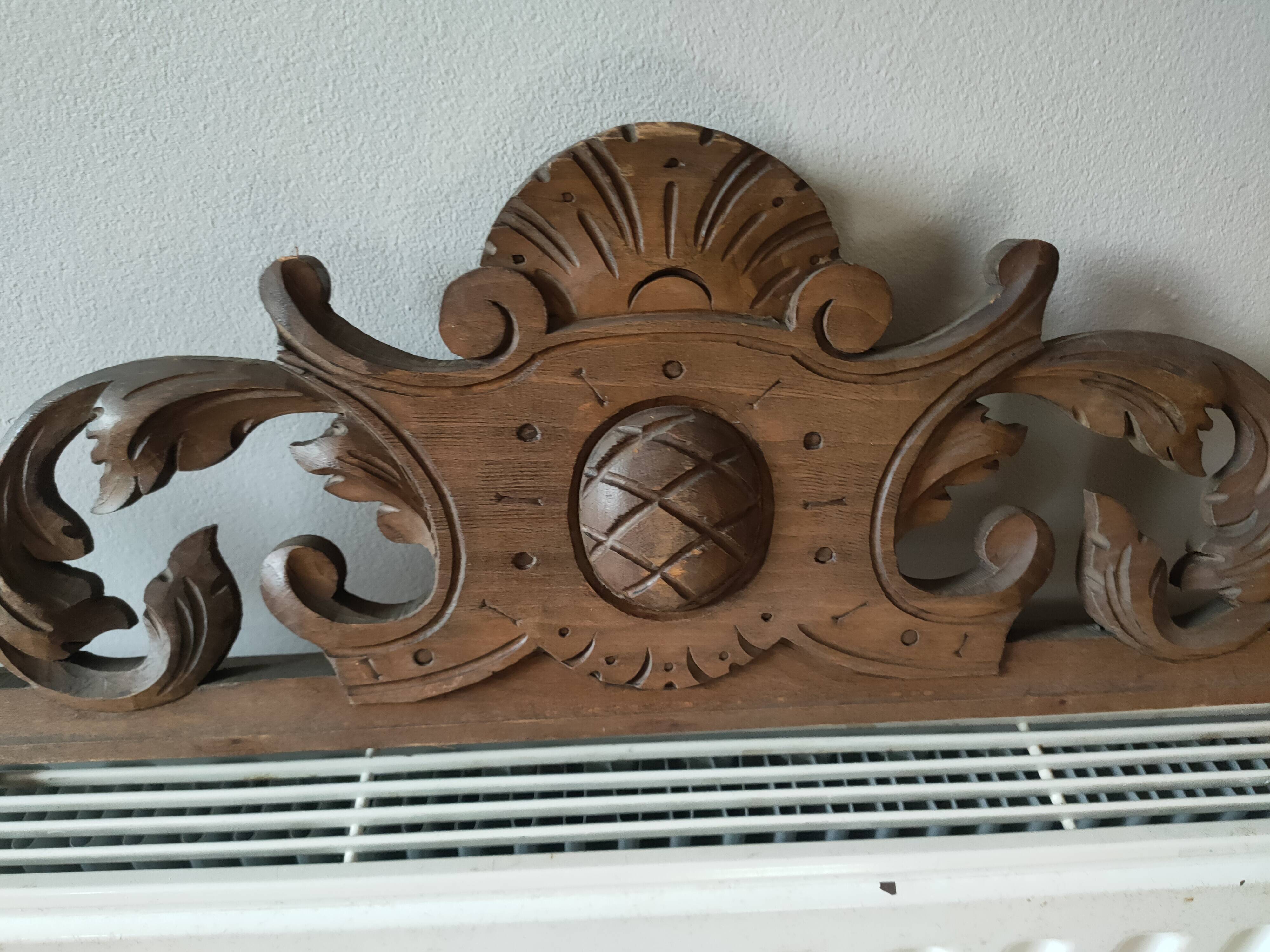Old carved wooden pediment