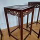 3 Chinese nesting tables in wood and brass.
