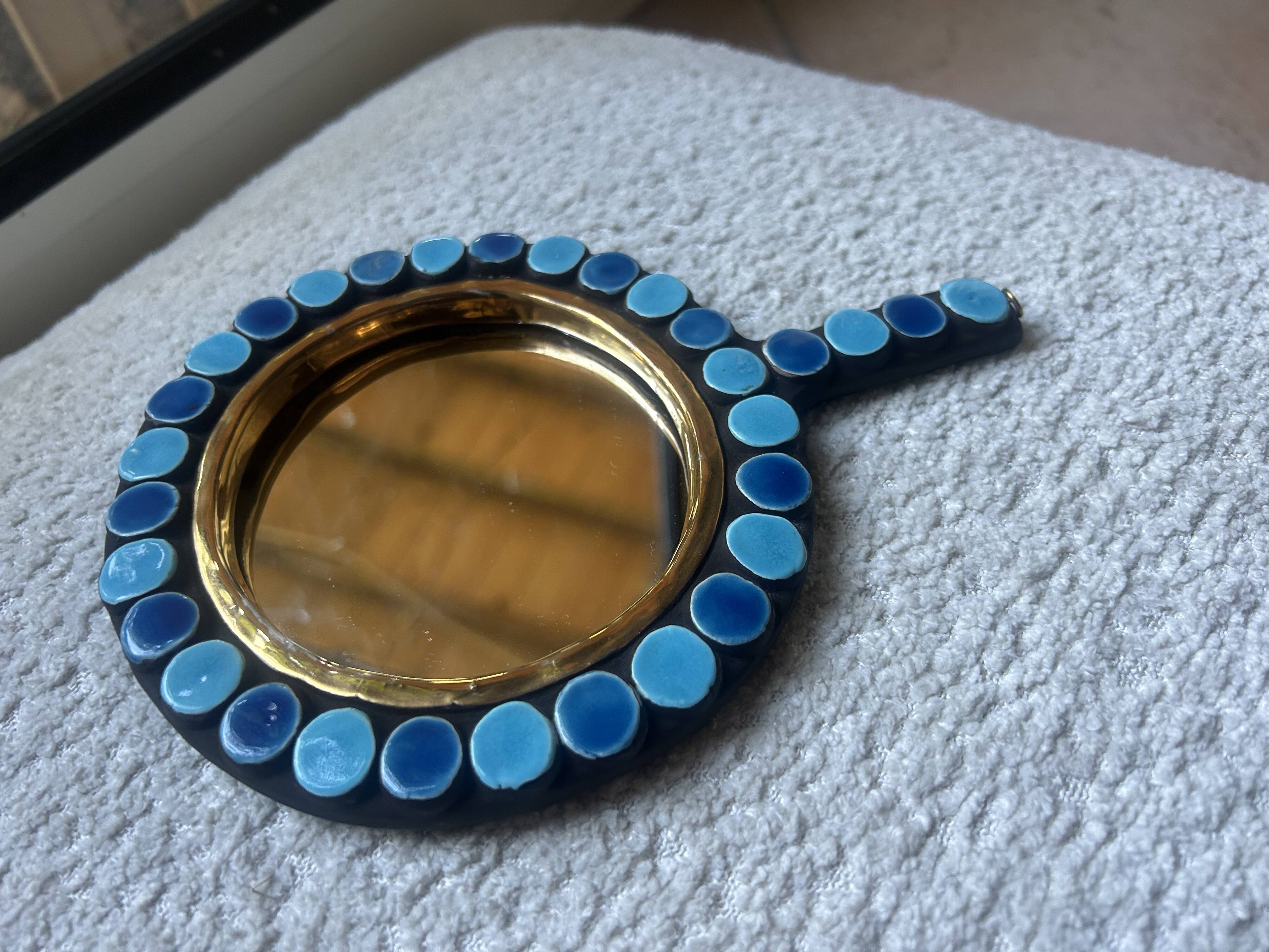 Mithé Espelt handheld mirror