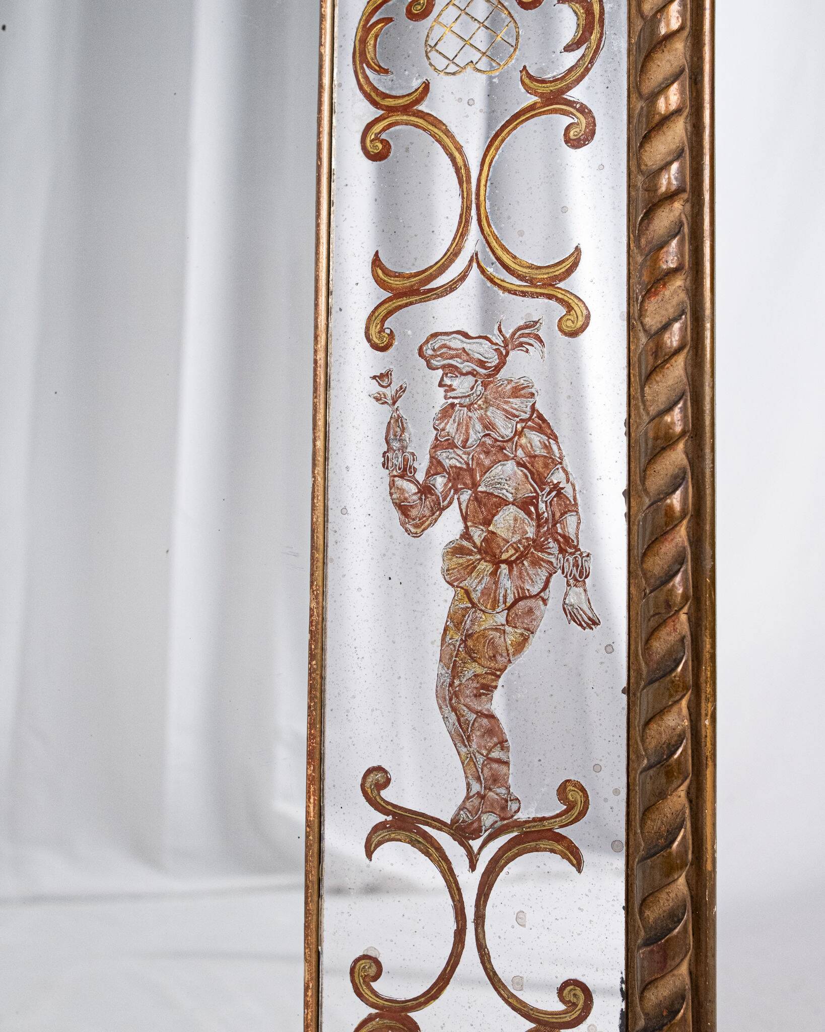 Miroir italien en verre églomisé, à parecloses, début XXe siècle