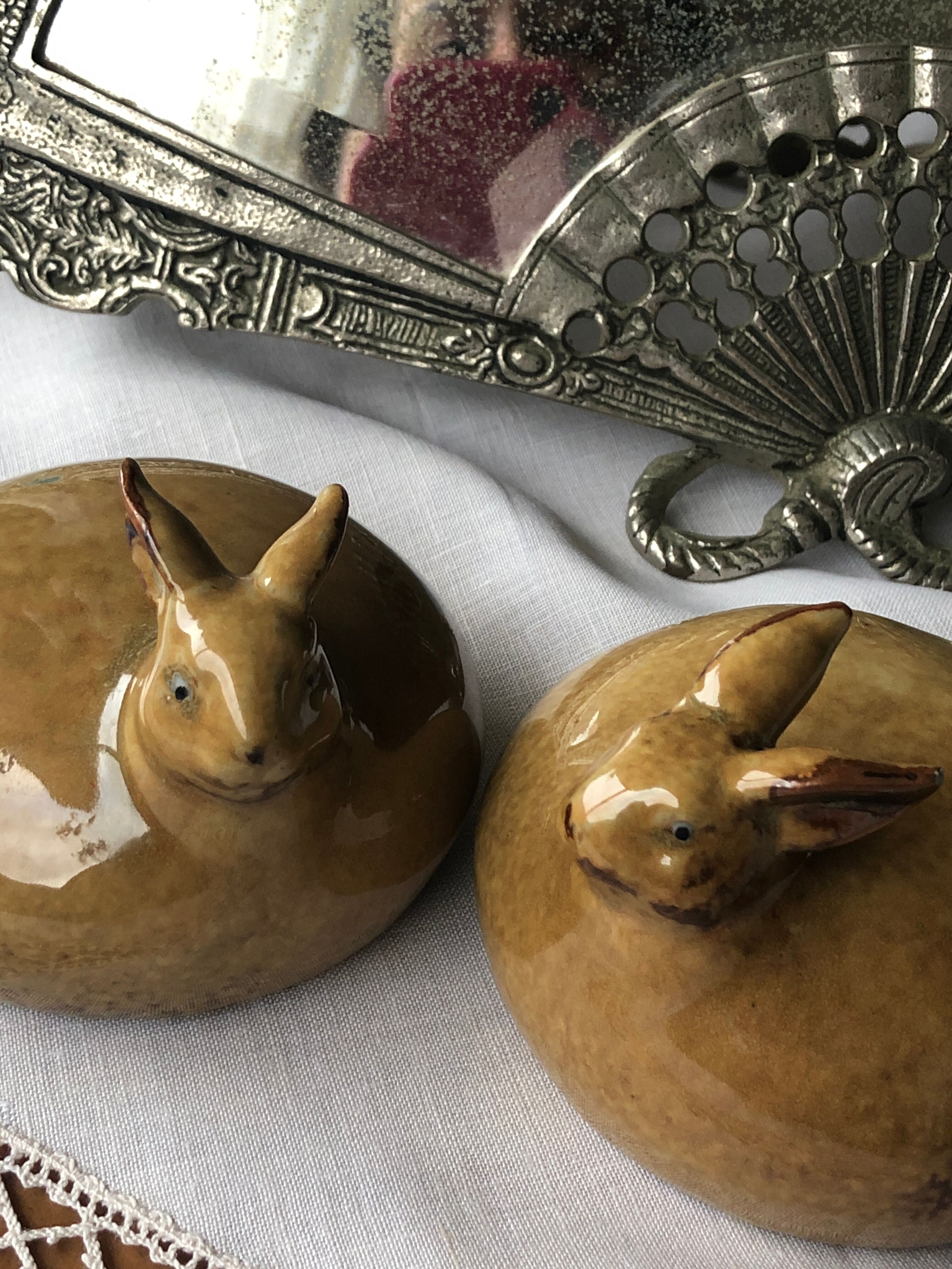 Glazed stoneware rabbits