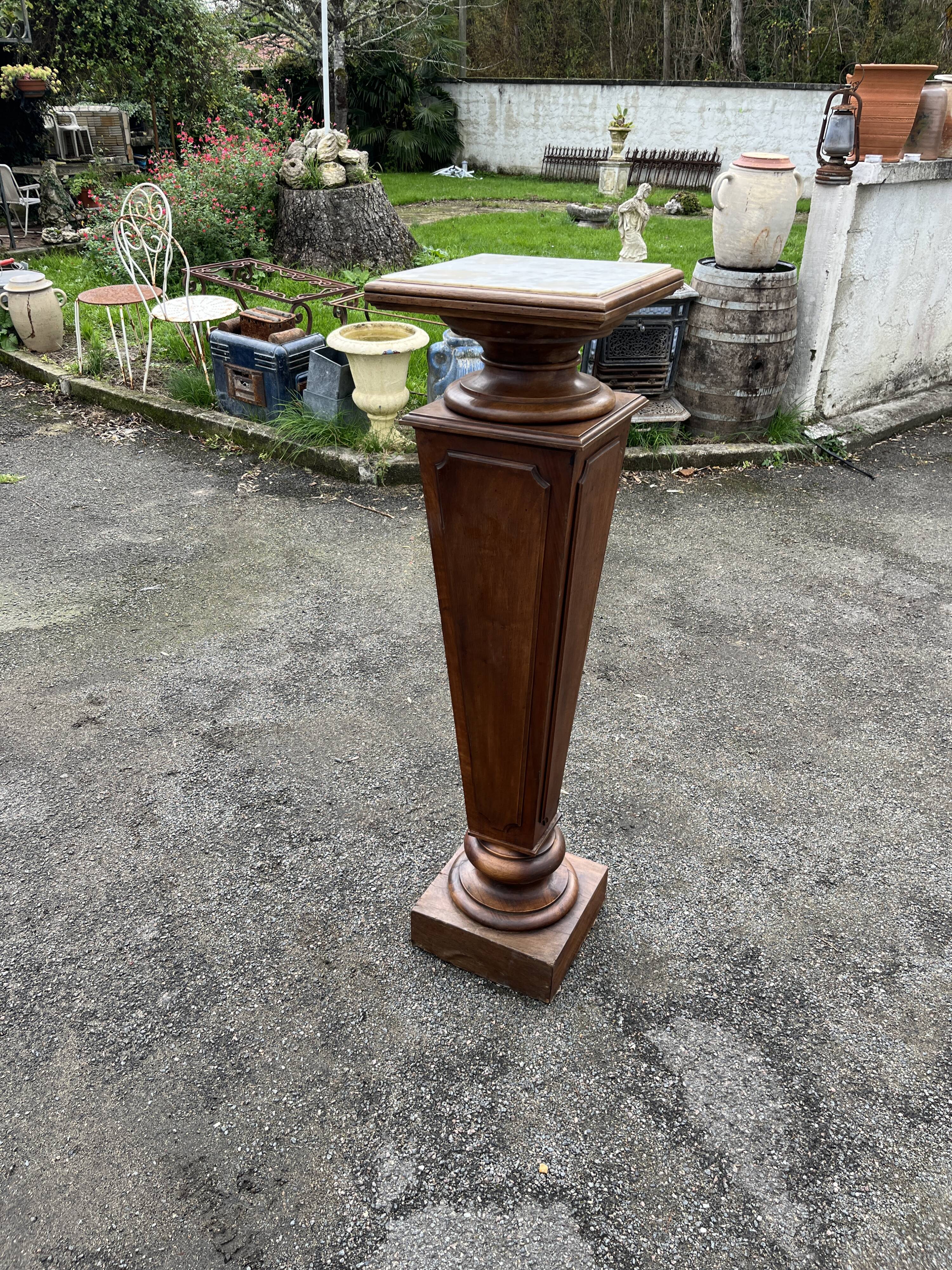 Large wooden and marble column/sheath