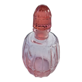 Pink molded glass bottle