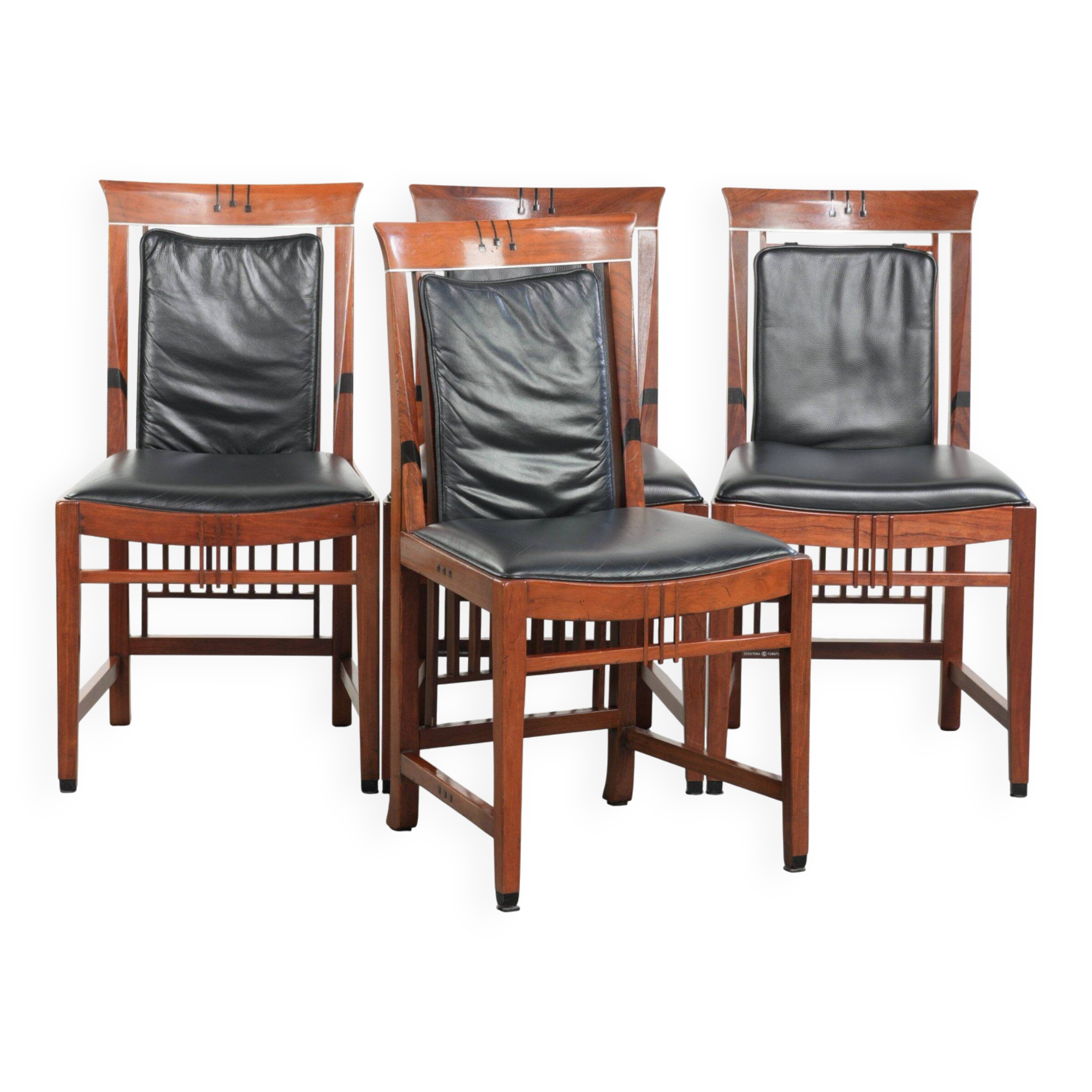 Elegant set of four black cowhide and wooden Art Deco dining chairs