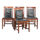 Elegant set of four black cowhide and wooden Art Deco dining chairs
