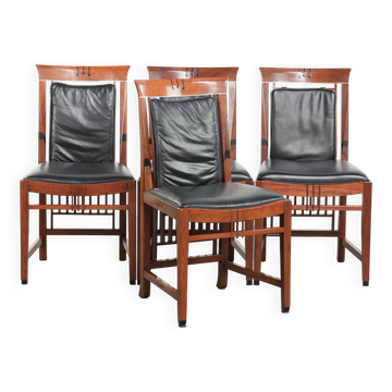Elegant set of four black cowhide and wooden Art Deco dining chairs