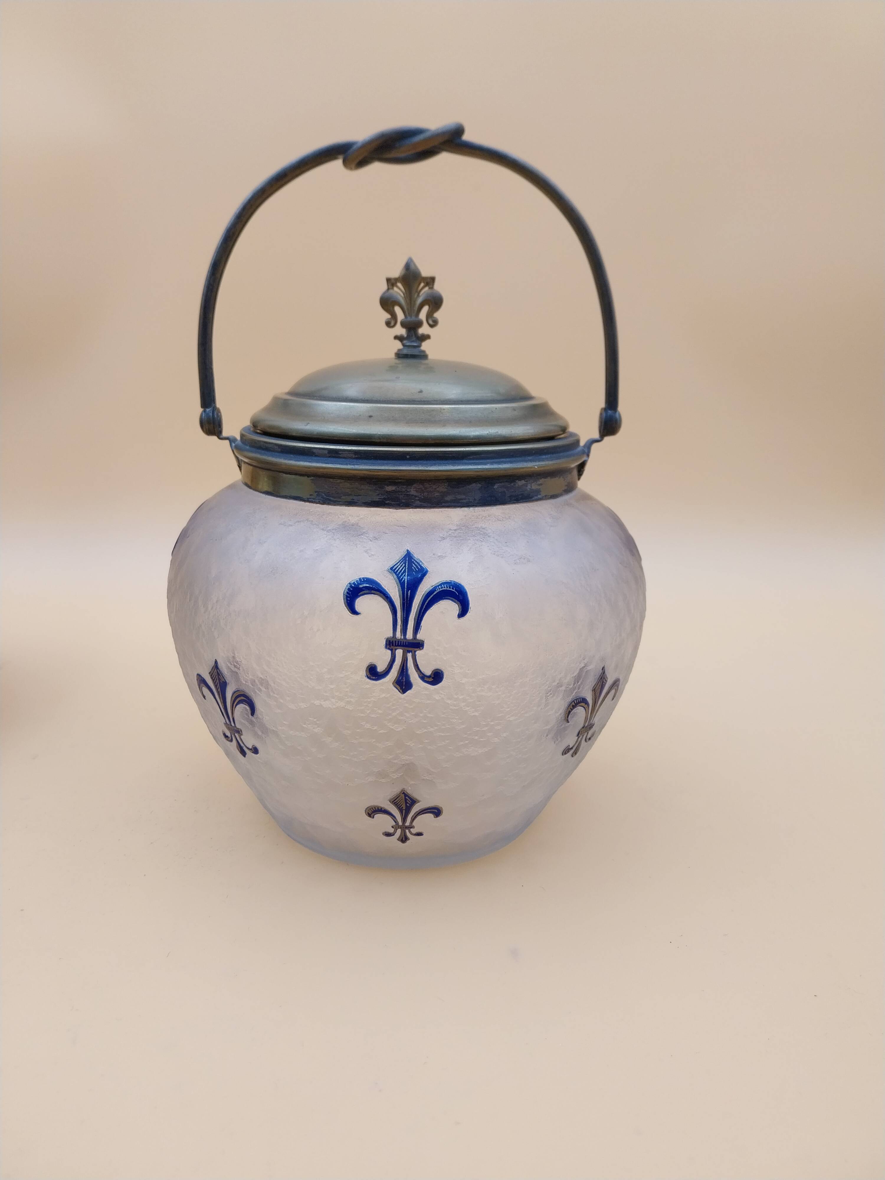 Crystal biscuit jar decorated with blue enamel and gilding.