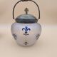 Crystal biscuit jar decorated with blue enamel and gilding.