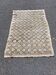 Tapis persan en laine nouée beige fleur 170x90