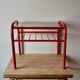Vintage side table in red tubular steel - smoked glass window - 1980s