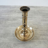Old metal push candle holder