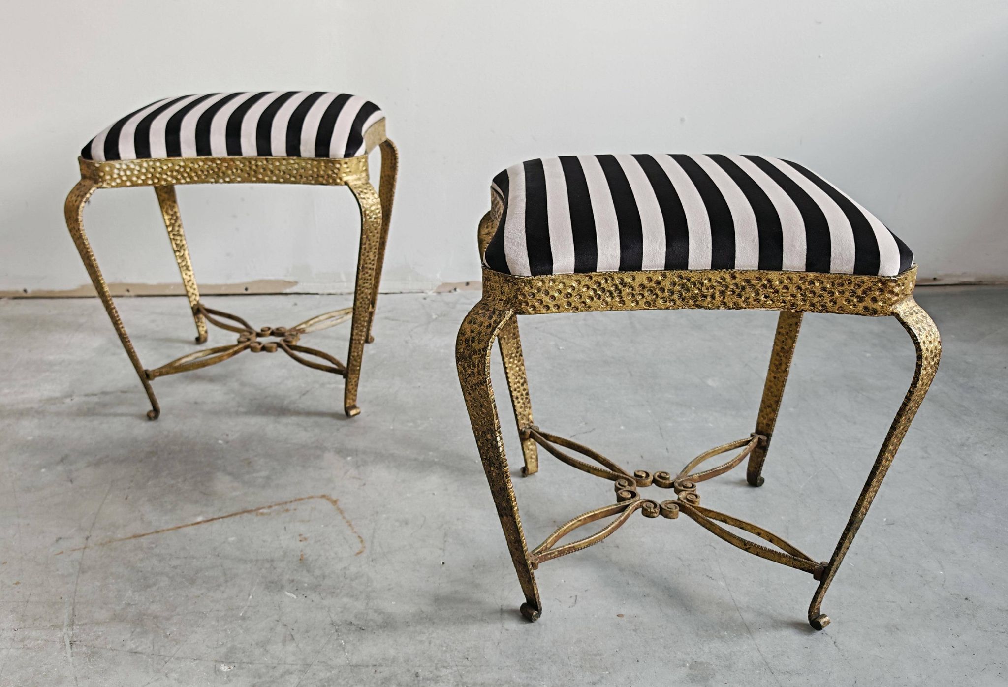 Pair of Mid Century Modern ottomans by Pier Luigi Colli from the 1950s.