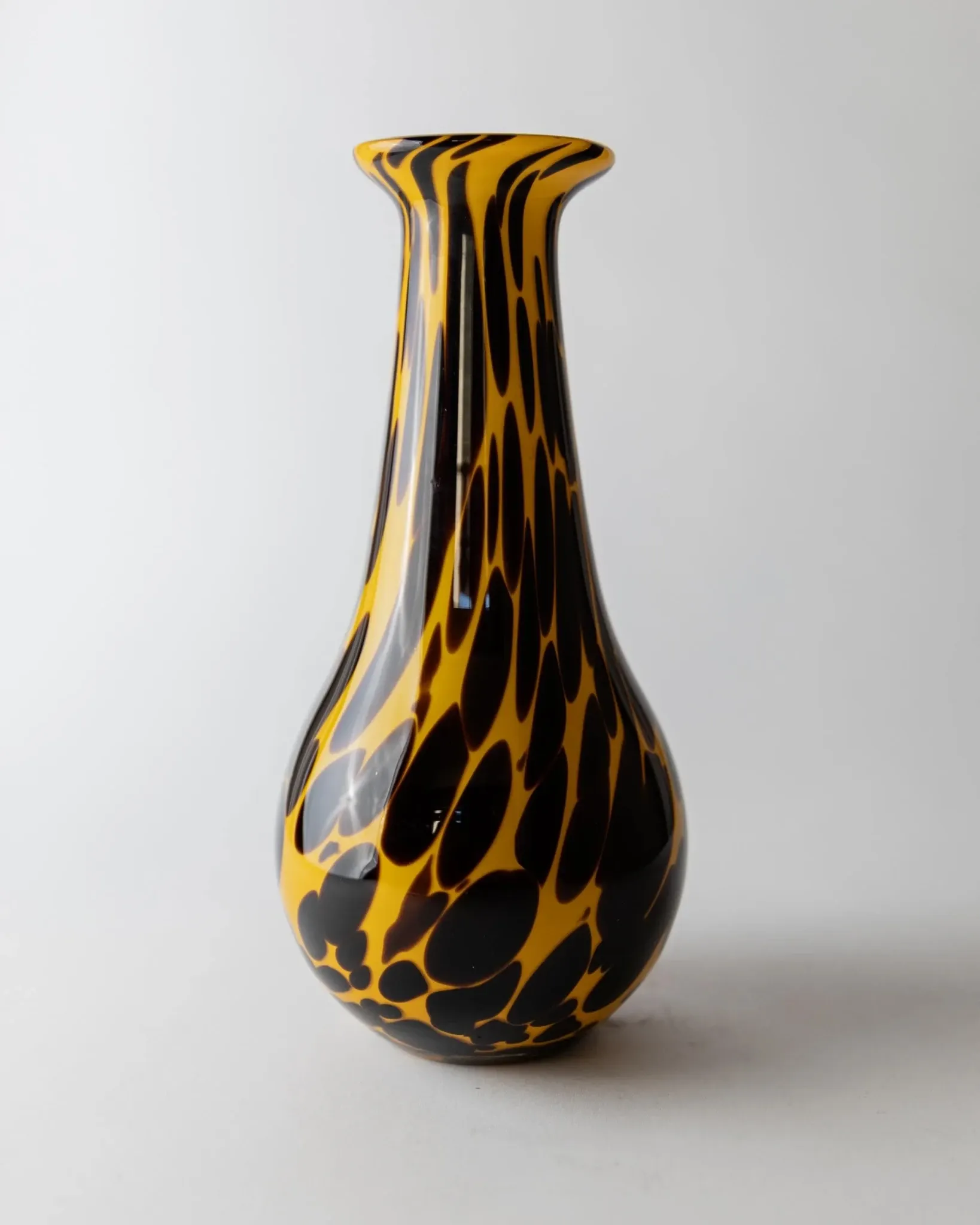 Vintage Murano glass vase from the 1990s, yellow art glass with black spots, postmodern Italian design.