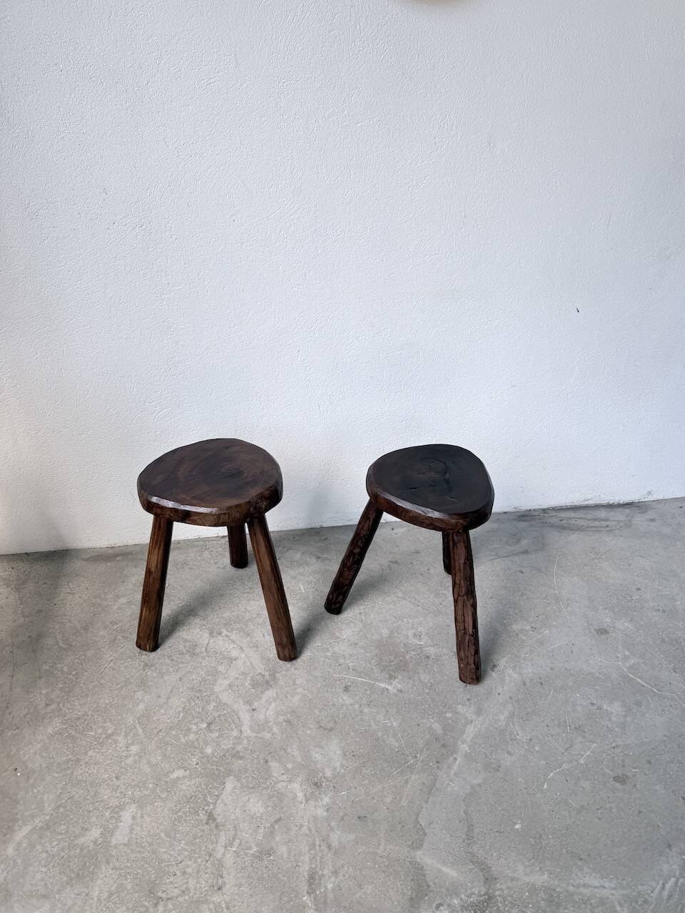 Pair of tripod stools in oak